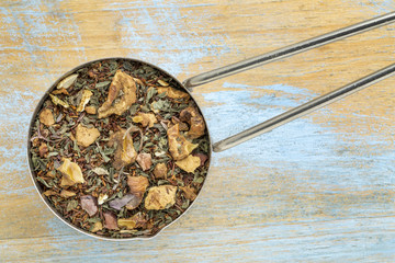 Chocolate rooibos mint tea in scoop