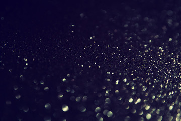 glitter vintage lights background. defocused