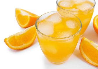 Iced orange drink with fresh pieces isolated on white