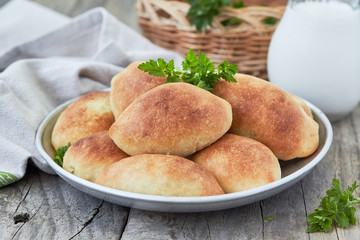 Fresh baked pasties and jug of milk