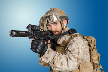 Fototapeta premium Modern soldier with rifle