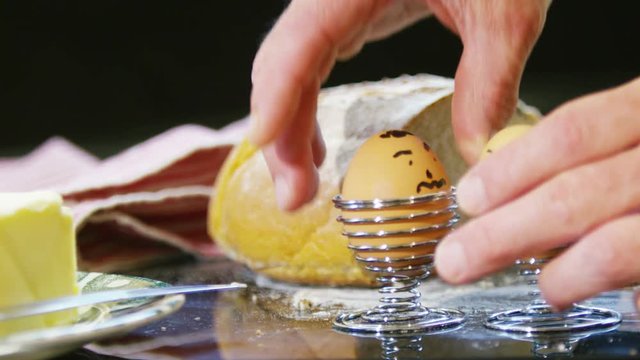  Close up of a happy healthy breakfast - boiled eggs with happy faces
