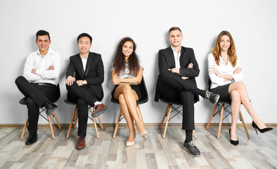 Group of people waiting for interview indoors