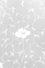 Close-up of sticker opaque flower. Abstract background. Use for glass window home decorate. (Selective focus on flower)