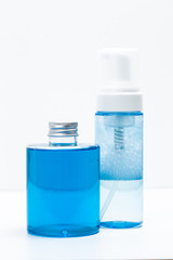 Cosmetic containers isolated on white