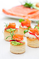 salted  puff pastry stuffed with cream cheese and smoked salmon
