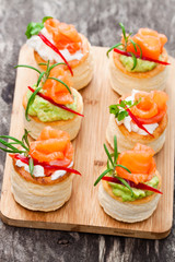 salted  puff pastry stuffed with cream cheese and smoked salmon