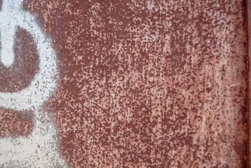surface of rusty iron with remnants of old paint , great background or texture for your project