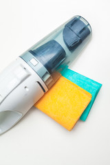 a hand-held vacuum cleaner on a white background