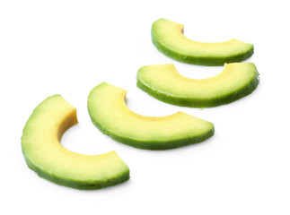 Pieces of avocado isolated on white © Africa Studio