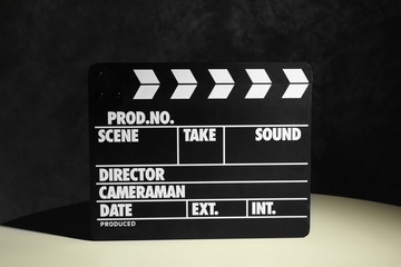 Movie clapper on dark background
