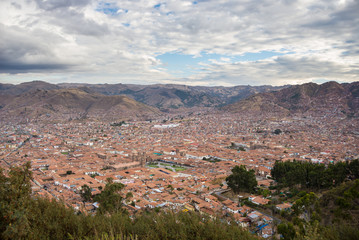 Expansive cityscape of Cusco, Peru, and cloudscape from above