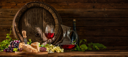 Still life with glass of red wine
