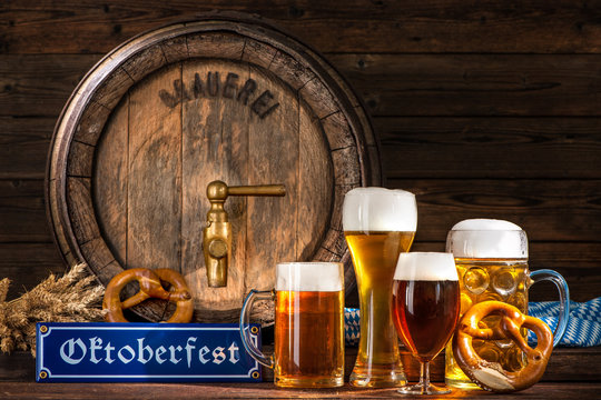 Oktoberfest beer barrel with beer mugs