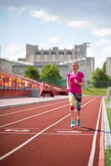 the girl is trained at the stadium