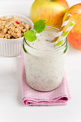 Milk smoothies with chia in glass jar