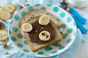 Bread with chocolate cream bear children for breakfast