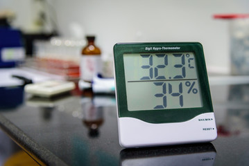 Digital hygro thermometer in laboratory - obrazy, fototapety, plakaty