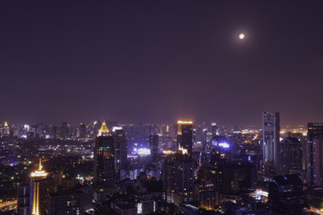 urban cityscape night view and moon light