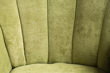 detail of green armchair