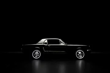 Fotobehang Zwarte speelgoedauto © ardasavasciogullari