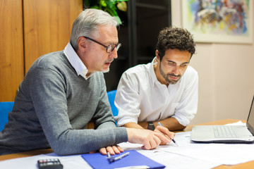 People at work in their office