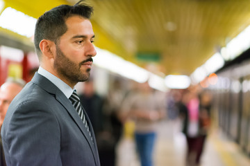 Man waiting for the train in the subway