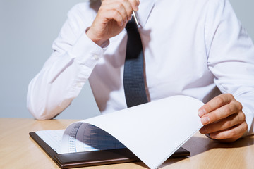 Businessman examining documents