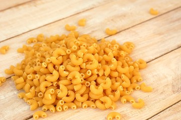 Pasta on the wooden background