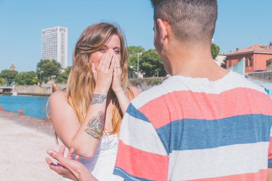 Incredulous girl meets her boyfriend after a long time