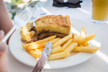 Moussaka with french fries