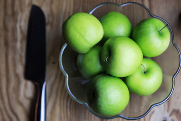 green apple on a wooden background