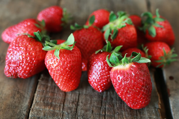 strawberries on a wooden background