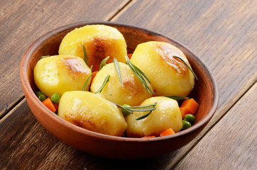 Boiled and baked potato and vegetables