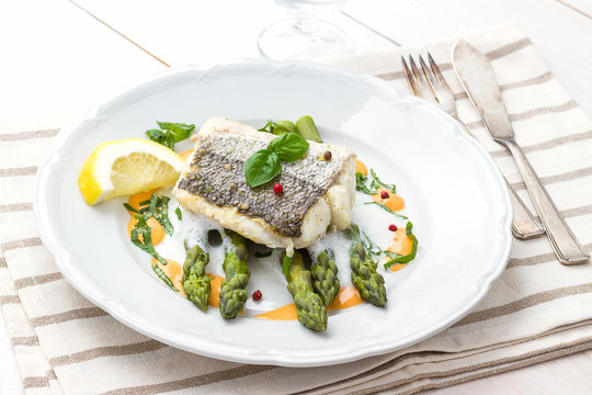 Hake fillet with asparagus foam sauce