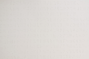 Close up of paper page with braille text. - obrazy, fototapety, plakaty