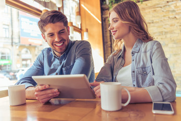Young couple in the cafe