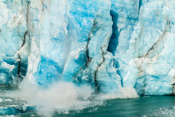 Fototapeta na wymiar Icebergs falling off Perito Moreno glacier in Patagonia, Argentina