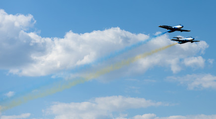 planes performing colorful trails at Kharkiv airshow