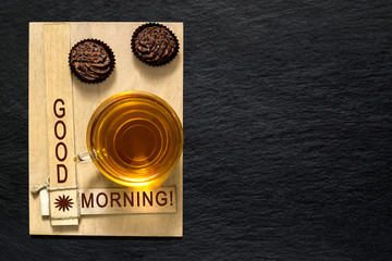 Chocolate mini cakes and a cup of tea
