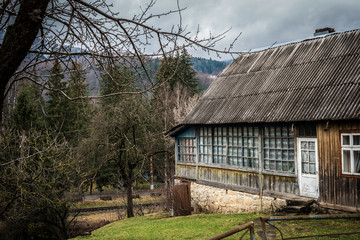 Fototapeta na wymiar scenic landscape with wooden cabin in Carpathian mountains, Ukraine