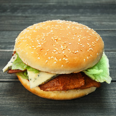 Meet and cheese burger at rustic wood
