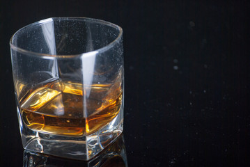 Whiskey Glass - Scotch Glass with background and shinny reflection on bottom