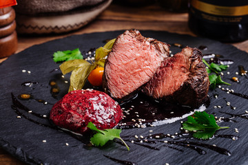 Juicy Beef rump steak from marble beef medium rare with spices a