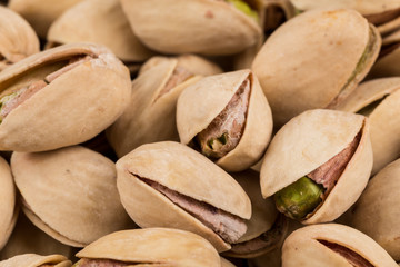 Pistachio nuts arranges as background