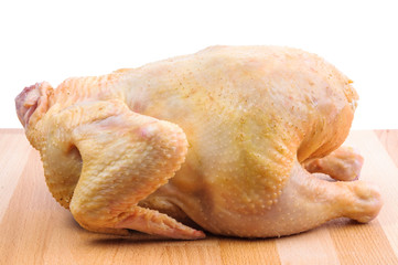 Raw chicken isolated on white  © Edgie