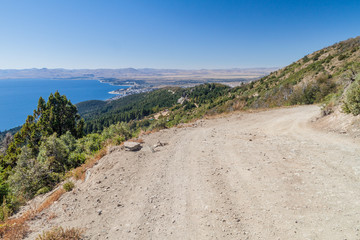 Aerial view of Nahuel Huapi lake and a road to Cerro Otto mountain near Bariloche, Argentina
