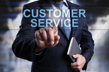 Businessman is pressing on virtual screen and selecting Customer service.