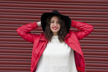 urban fashion girl on red background