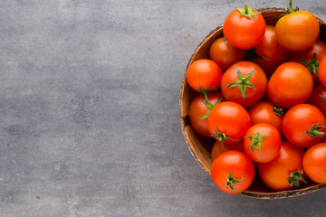 Tomato on the gray background.